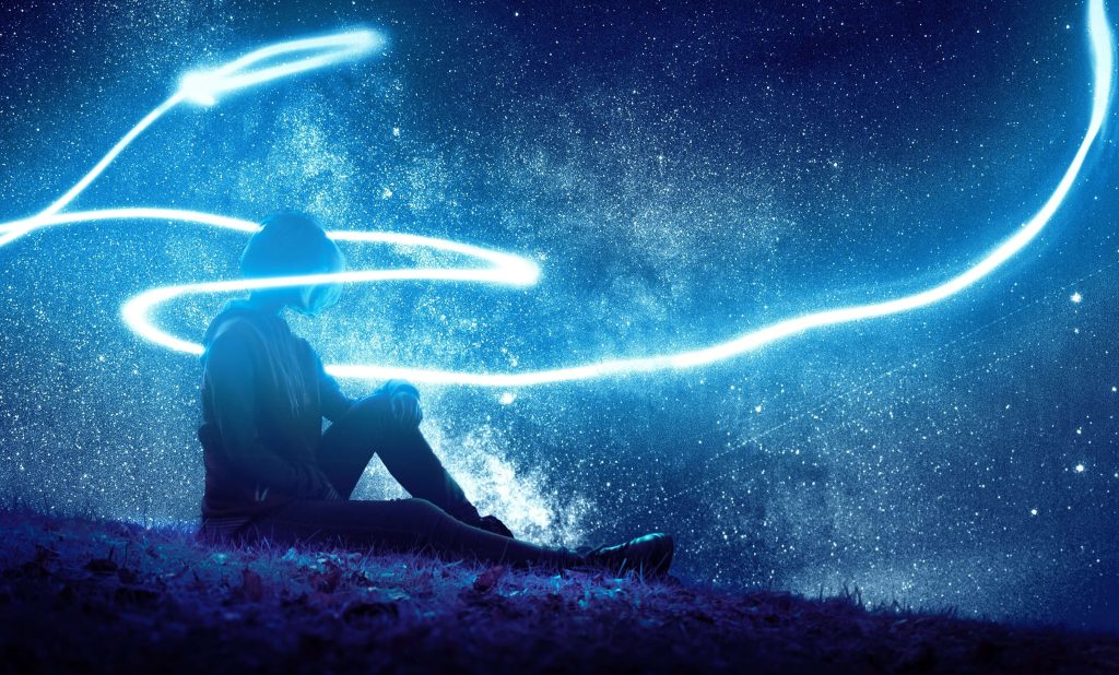 Man with abstract blue light spiral around him