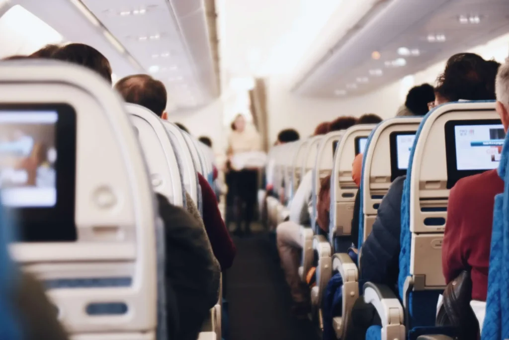 Airplane isle with many passangers
