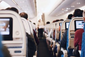 Airplane isle with many passangers