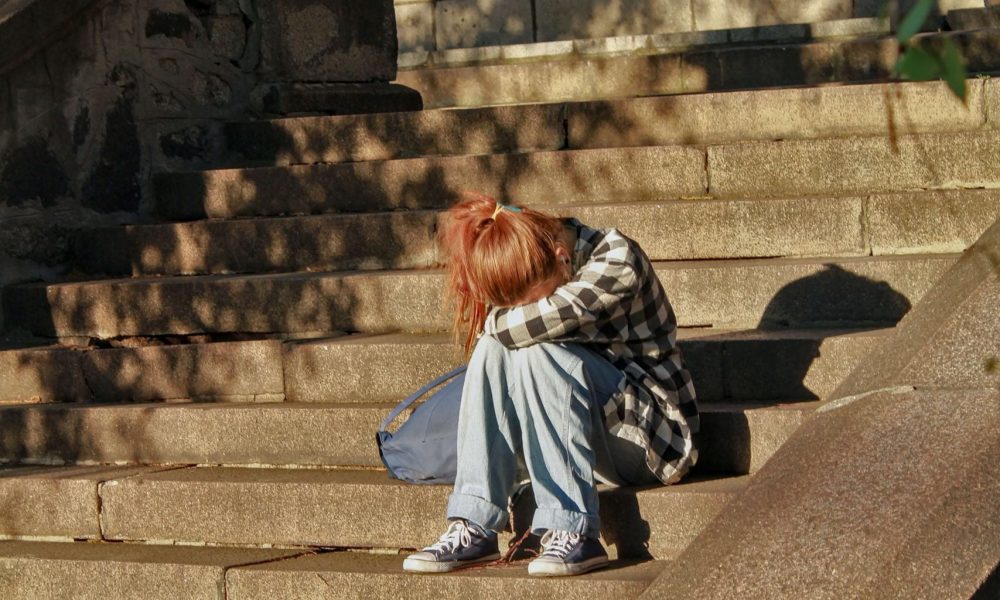 sad girl crying on stairs sad girl crying on stairs